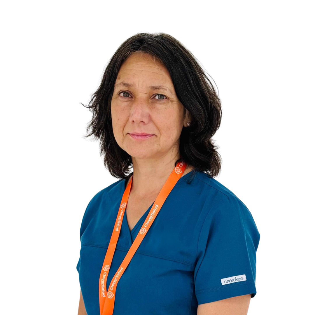Portrait of a female healthcare worker in blue scrubs wearing an orange lanyard against a white background.