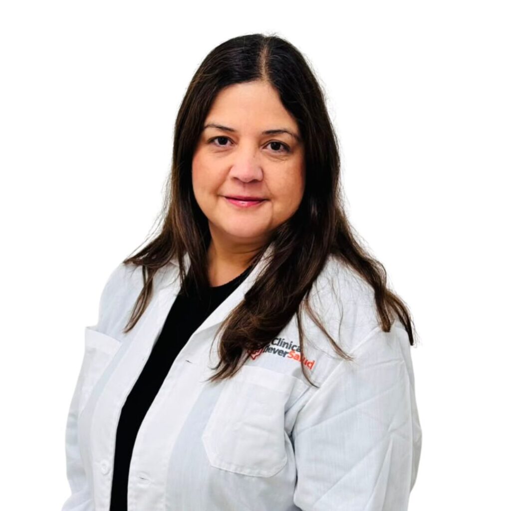 Portrait of a female clinician in a white lab coat, facing the camera against a white background.