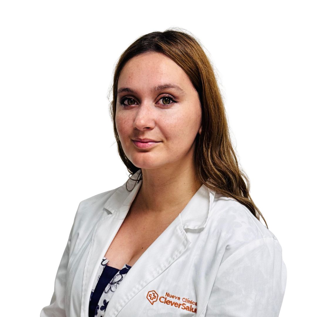 Portrait of a female clinician in a white lab coat, facing the camera.